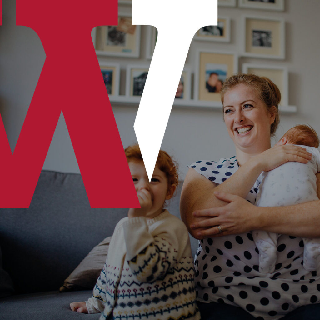 Happy family with Robert Watts estate agent logo.